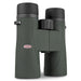 A pair of Kowa binoculars in their signature dark forest green color, featuring textured grip surfaces, black eyecups, and a silver Kowa logo badge on the front of the left barrel.