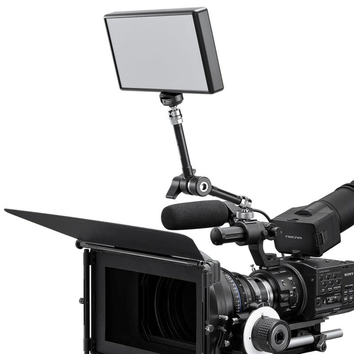 A Sony cinema camera with a mounted monitor, microphone, and matte box, shown against a solid white background.