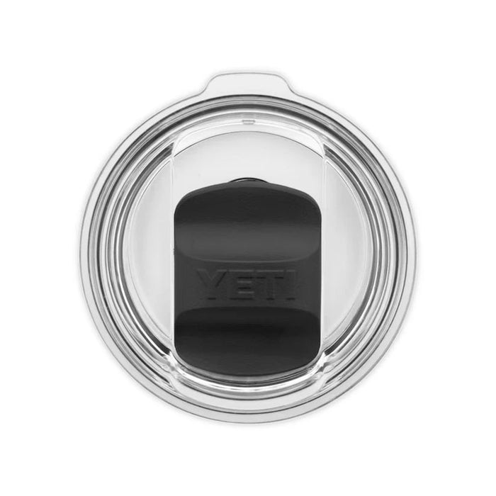 Top-down view of a YETI insulated tumbler lid with a clear outer rim and a black central silicone seal, shown on a white background.