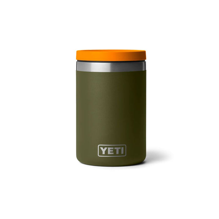 A YETI insulated tumbler in matte olive green with a bright orange lid, shown on a clean white background.