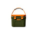 A YETI hard-sided cooler in dark green with bright orange accents, including the handle, latches, and front logo badge, shown on a clean white background.