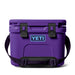 Purple YETI cooler with black straps on a white background