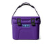 A purple YETI cooler with black latches and a black carrying handle, shown against a plain white background.