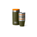 An olive green YETI insulated travel tumbler with a bright orange lid, shown next to a stack of three matching tumblers on a clean white background.