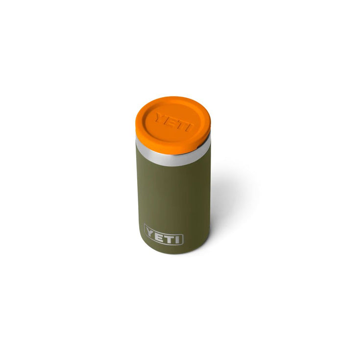 A YETI insulated travel tumbler in olive green with a bright orange lid, shown on a clean white background.