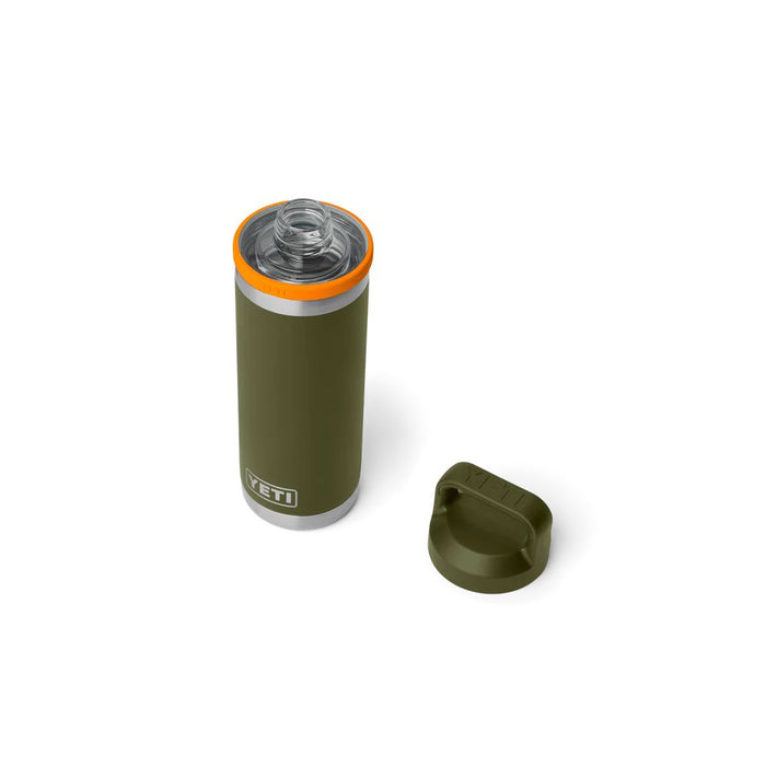 An olive green YETI travel tumbler with a clear lid and an orange rim, shown next to its matching dark green cap on a white background.